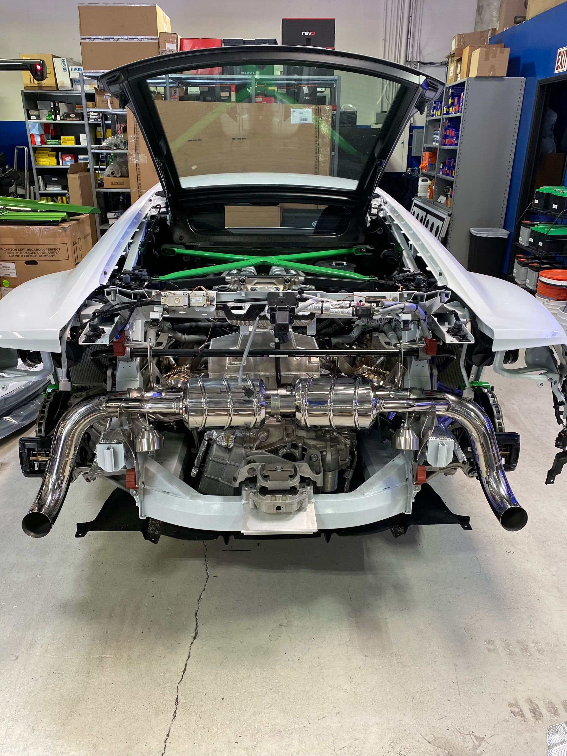 Engine bay disassembly during a performance installation
